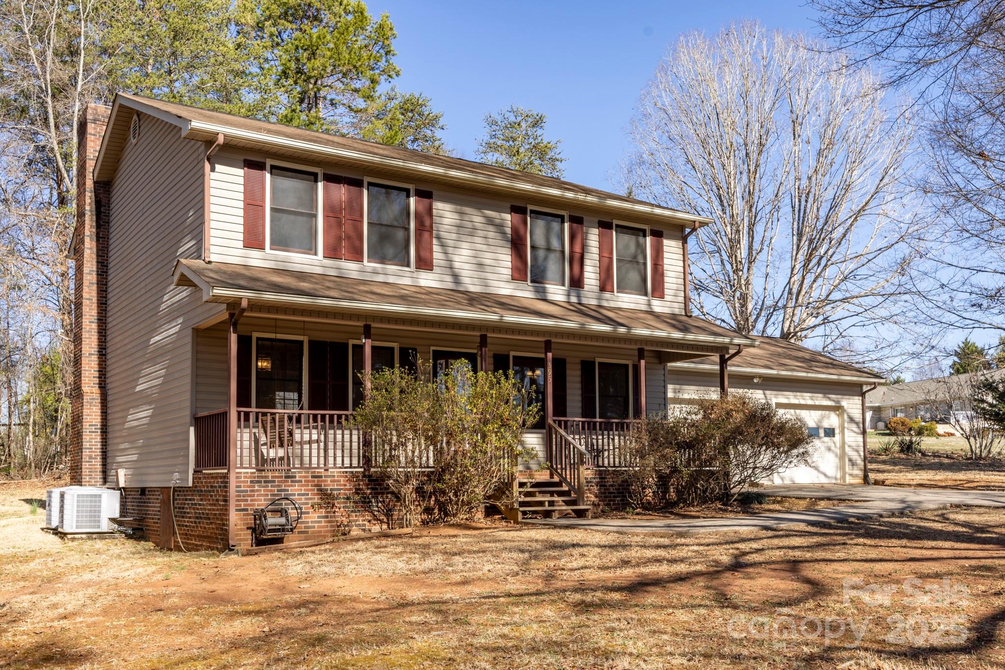 395 Thompson Road Rutherfordton, NC 28139 - Photo 24 of 25 a front view of a house with garden