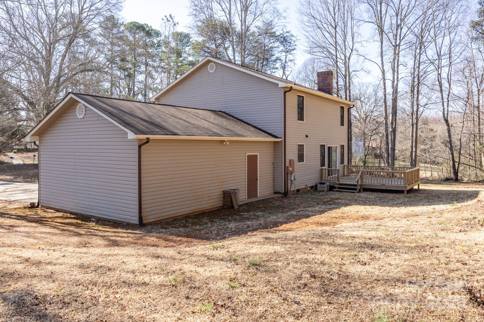 395 Thompson Road Rutherfordton, NC 28139 - Photo 25 of 25 a view of a house with a yard covered in snow