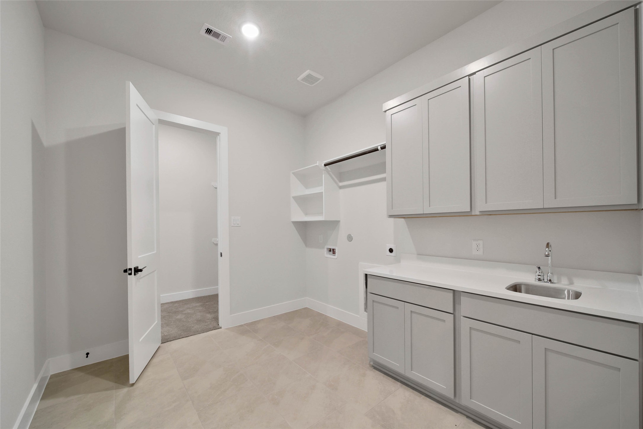 4610 Magnolia Bend Drive Rosharon, TX 77583 - Photo 25 of 48 a view of a kitchen with white cabinets