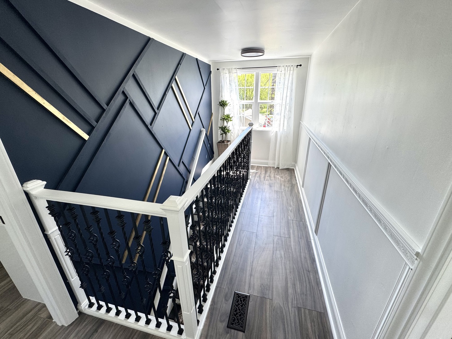931 South Rawson Bridge Road Cary, IL 60013 - Photo 16 of 36 a view of an entryway with wooden floor