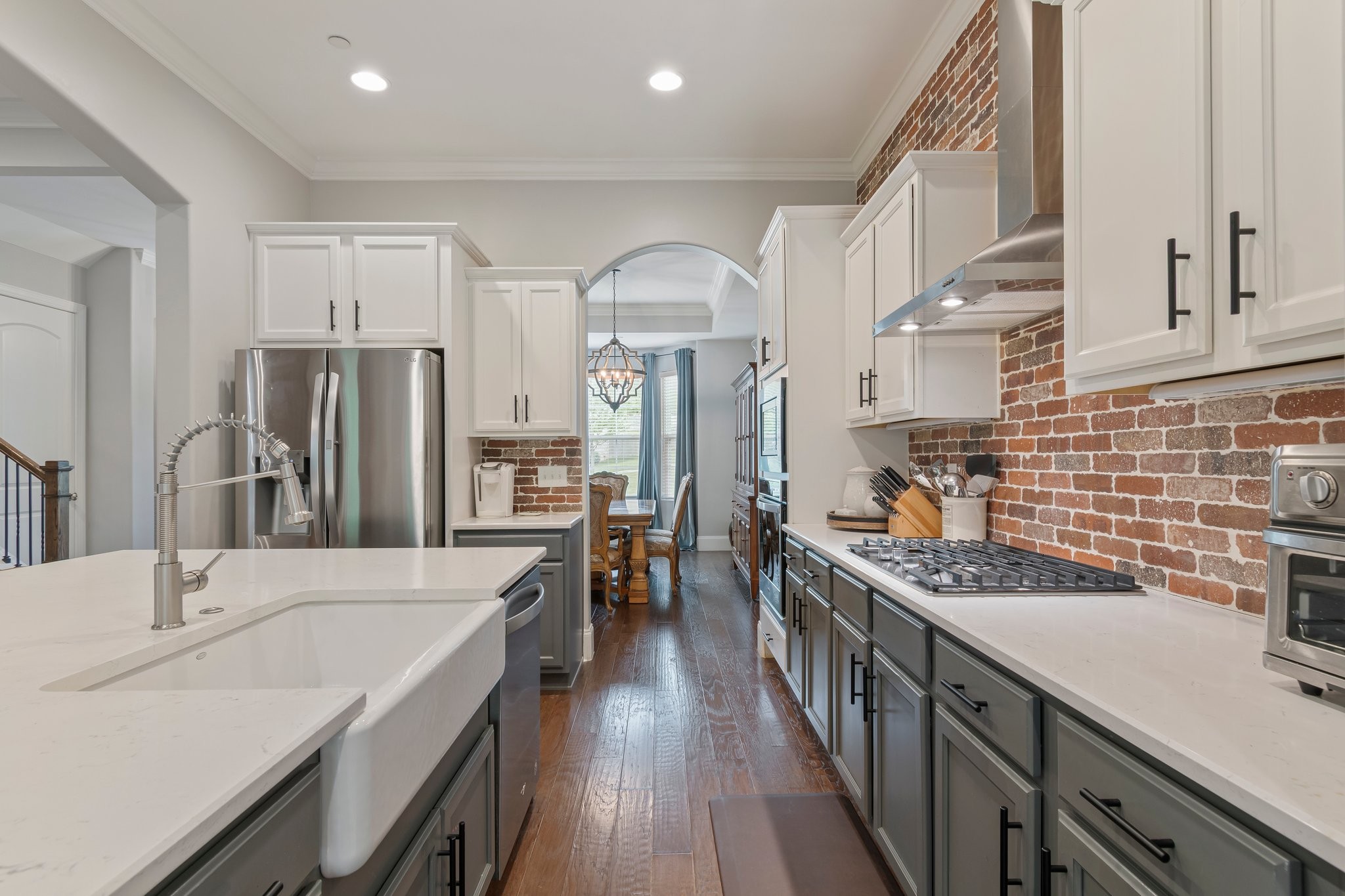 409 Eagle Ridge Nashville, TN 37209 - Photo 12 of 83 a kitchen with stainless steel appliances granite countertop a sink stove and refrigerator