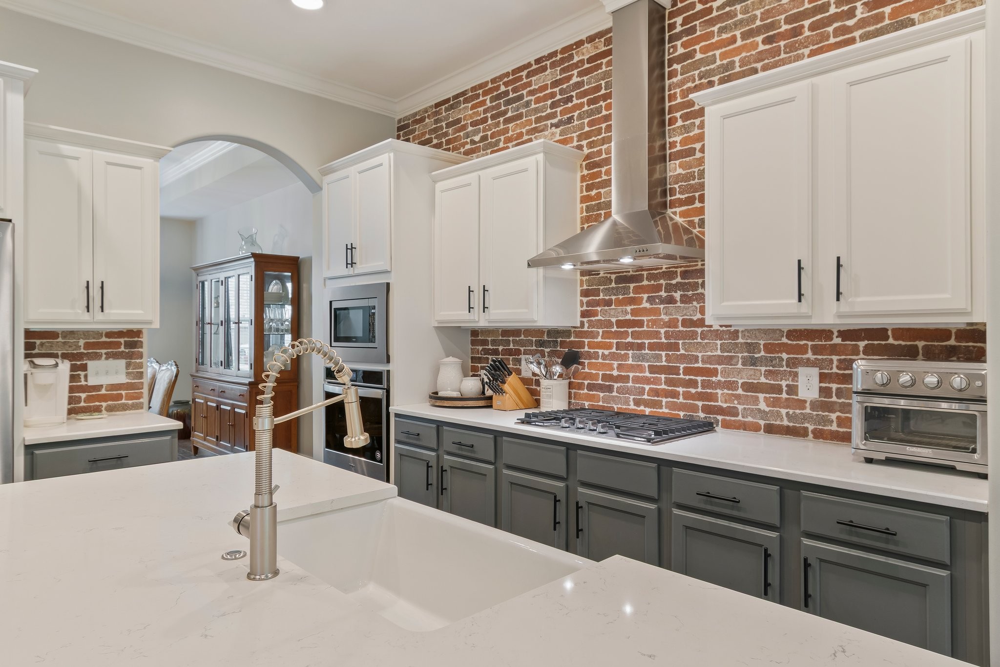 409 Eagle Ridge Nashville, TN 37209 - Photo 13 of 83 a kitchen with stainless steel appliances a sink stove and cabinets