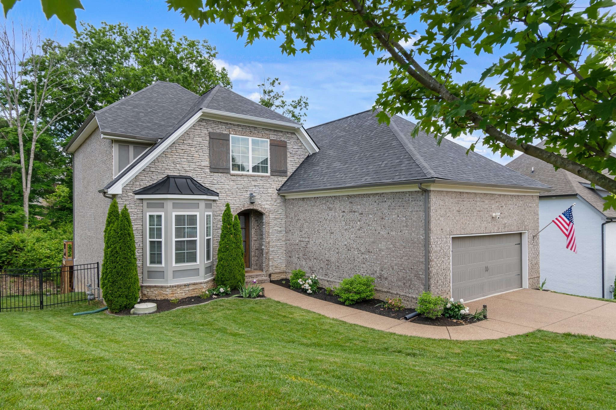 409 Eagle Ridge Nashville, TN 37209 - Photo 2 of 83 a front view of a house with a garden and plants