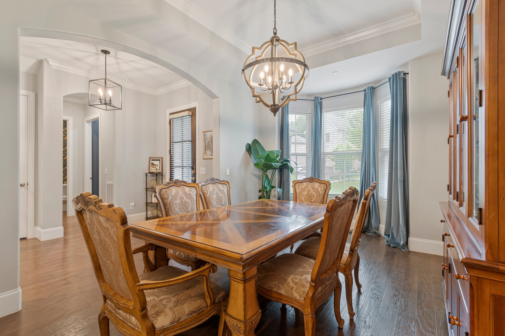 409 Eagle Ridge Nashville, TN 37209 - Photo 23 of 83 a view of a dining room with furniture wooden floor and chandelier