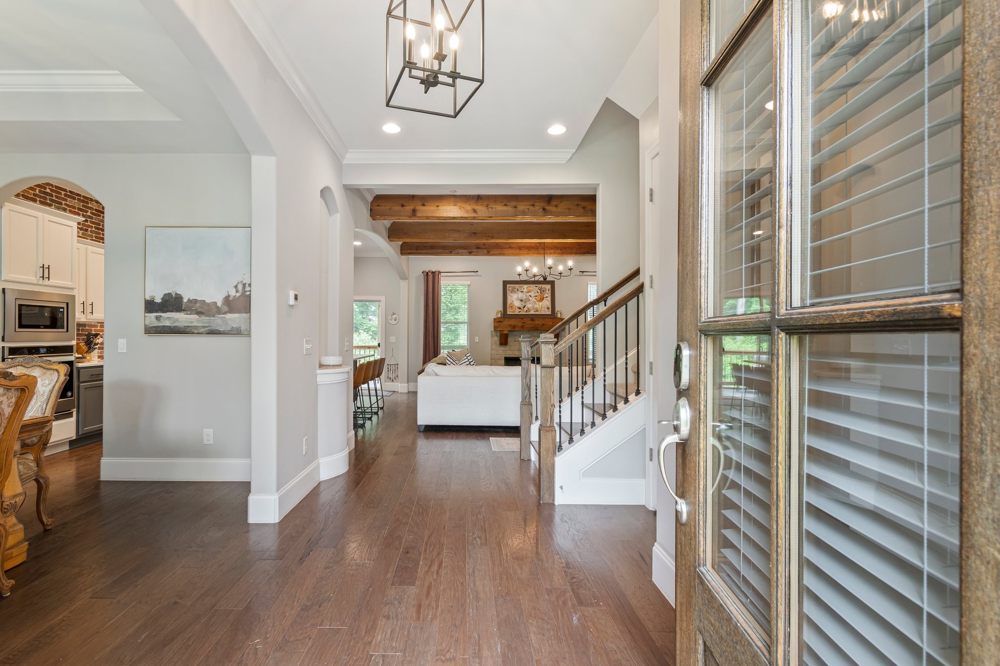 409 Eagle Ridge Nashville, TN 37209 - Photo 3 of 83 a view of a hallway with wooden floor and staircase