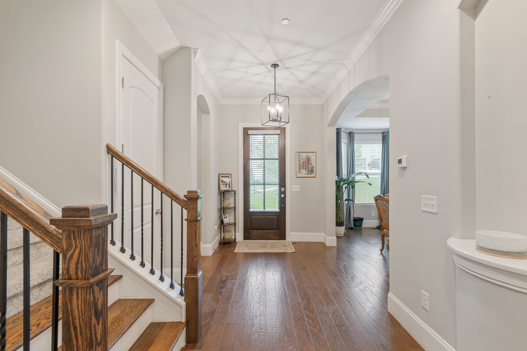 409 Eagle Ridge Nashville, TN 37209 - Photo 4 of 83 a view of a hallway view with wooden floor and staircase