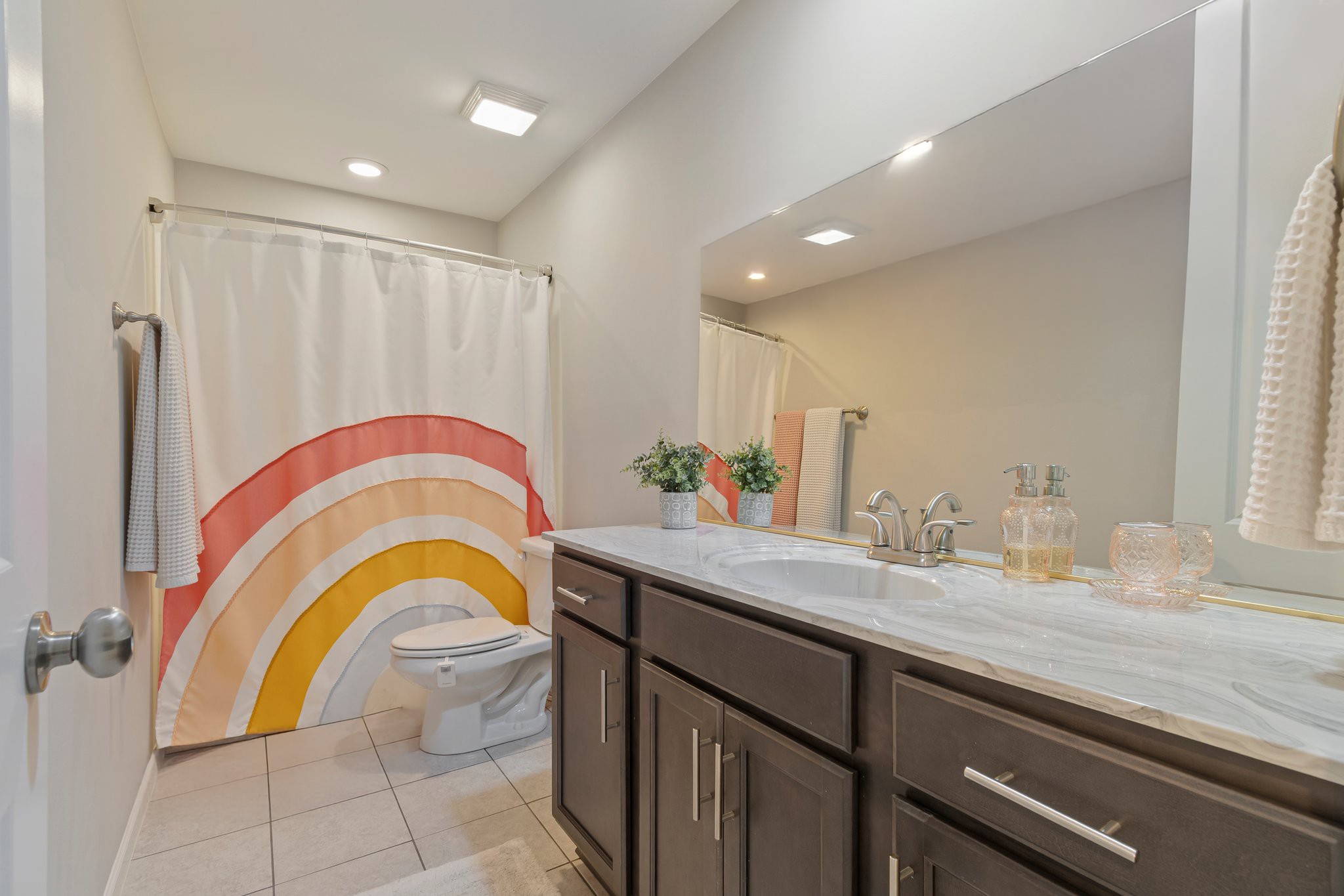 409 Eagle Ridge Nashville, TN 37209 - Photo 55 of 83 a room with kitchen island a sink stainless steel appliances and cabinets