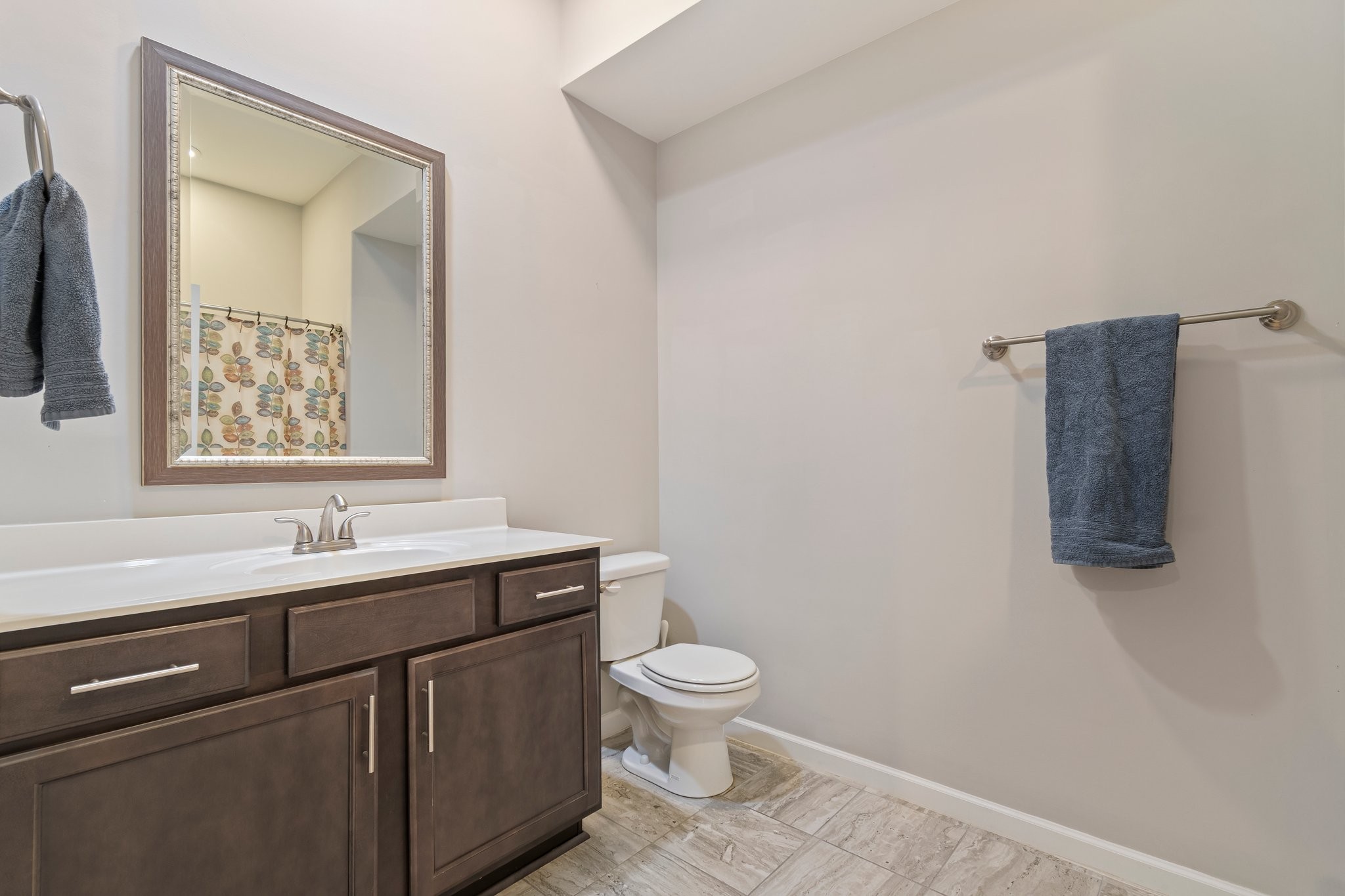 409 Eagle Ridge Nashville, TN 37209 - Photo 69 of 83 a bathroom with a toilet sink and mirror