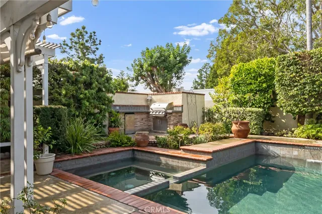 a view of swimming pool from a lounge chair