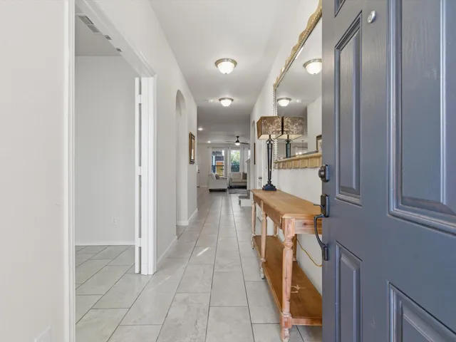 a view of a storage & utility room with two washing machine