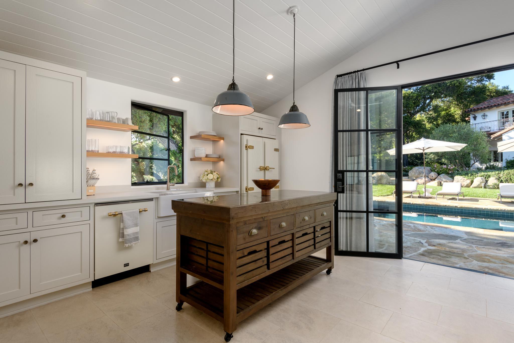 849 Ashley Road Montecito, CA 93108 - Photo 19 of 28 a spacious bathroom with a double vanity sink and a large window