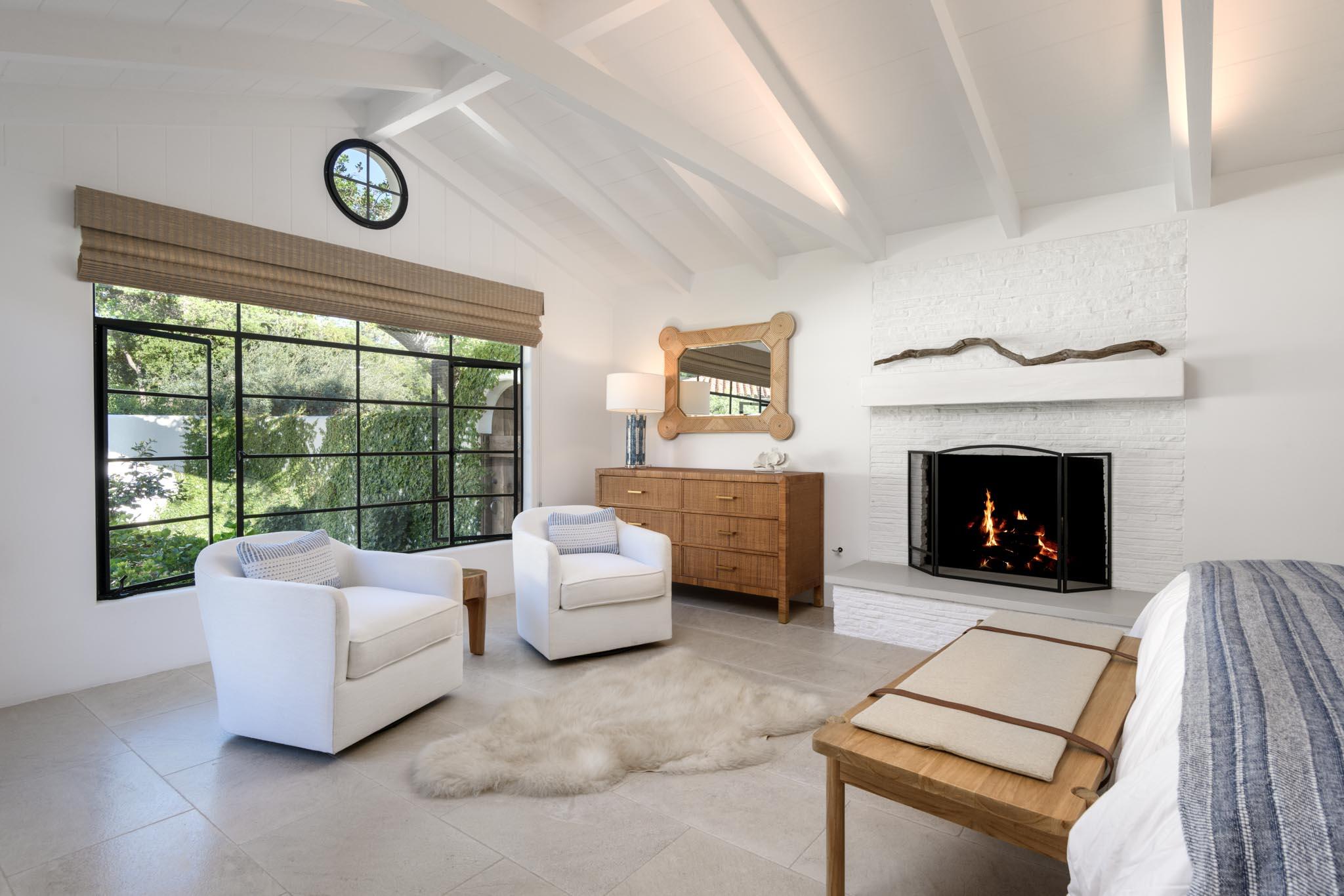 849 Ashley Road Montecito, CA 93108 - Photo 21 of 28 a living room with furniture a fireplace and a large window