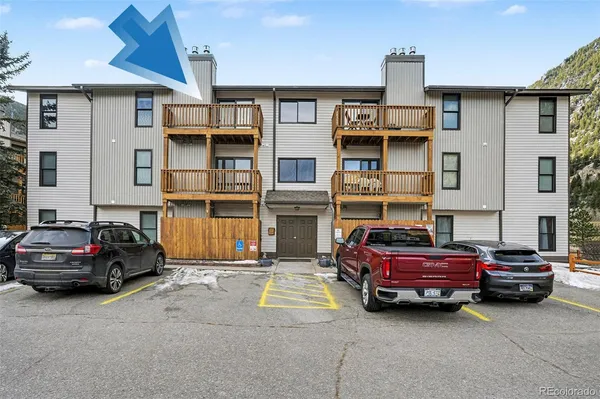 a car parked in front of a house