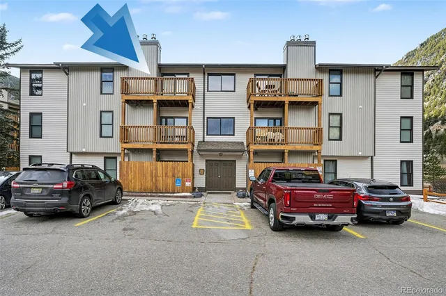 a car parked in front of a house