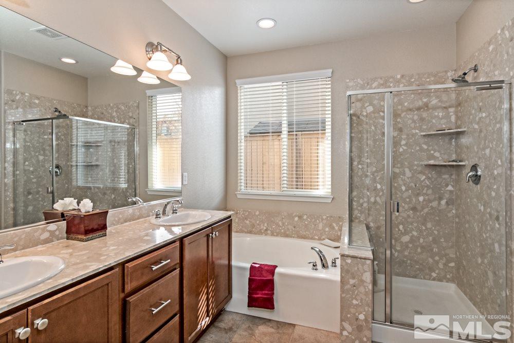 10755 Cedar Rock Drive Reno, NV 89521 - Photo 13 of 22 a bathroom with a granite countertop sink mirror and double