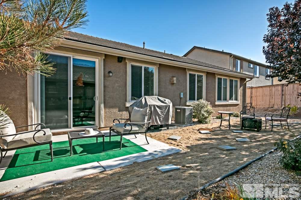 10755 Cedar Rock Drive Reno, NV 89521 - Photo 19 of 22 a front view of house with yard outdoor seating and green space