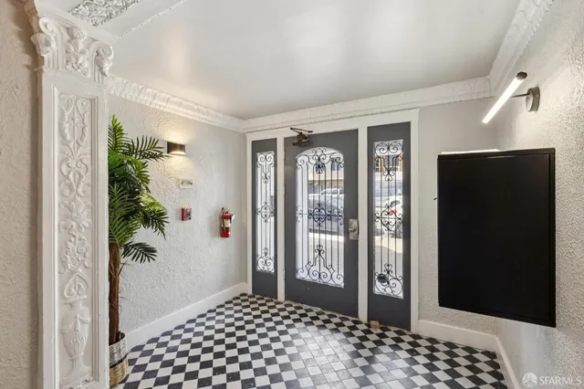 a bedroom with a balcony and furniture