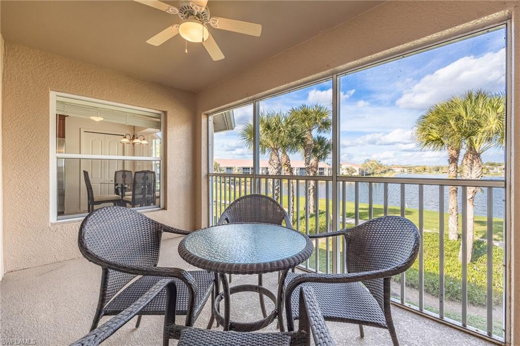 2770 Cypress Trace Circle, Unit 2425 Naples, FL 34119 - Photo 13 of 35 a view of a dining room with furniture window and outside view