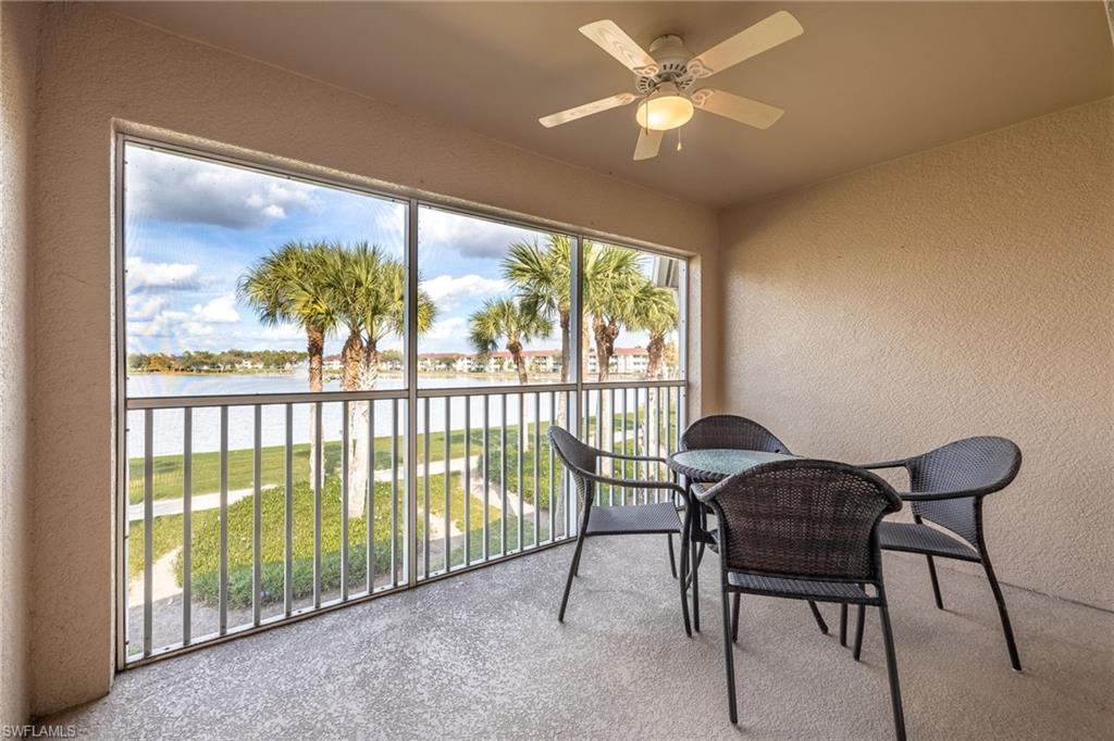 2770 Cypress Trace Circle, Unit 2425 Naples, FL 34119 - Photo 14 of 35 a view of a dining room with furniture window and outside view