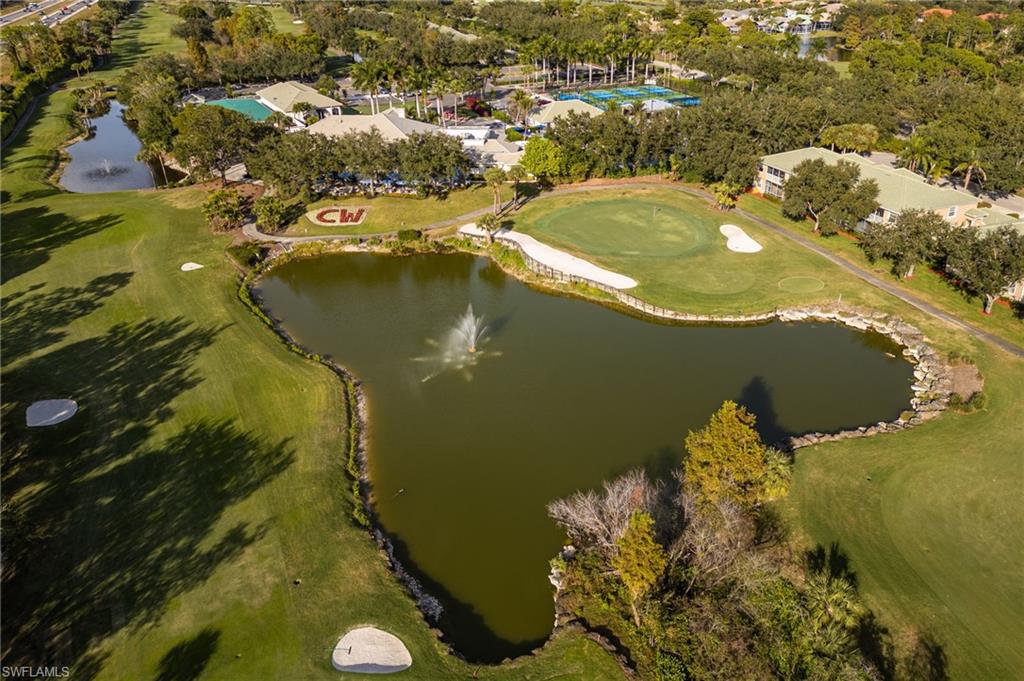 2770 Cypress Trace Circle, Unit 2425 Naples, FL 34119 - Photo 29 of 35 an aerial view of residential houses with outdoor space