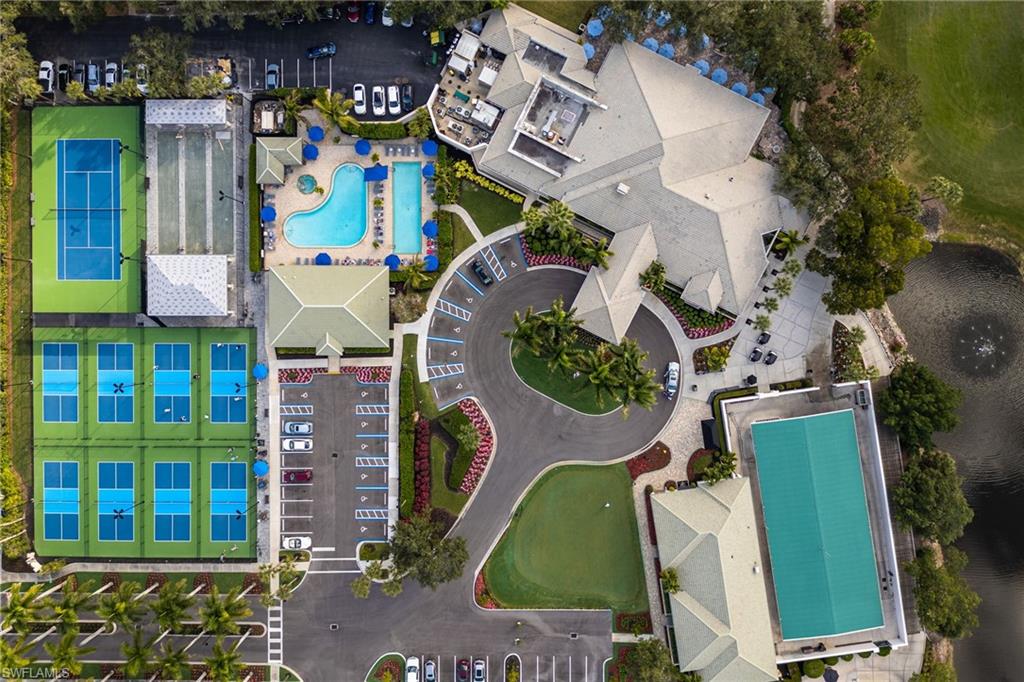 2770 Cypress Trace Circle, Unit 2425 Naples, FL 34119 - Photo 31 of 35 an aerial view of residential house with outdoor space and swimming pool