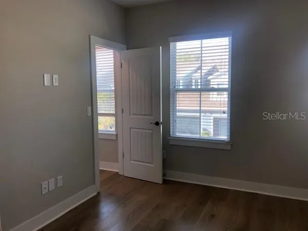 a bathroom with a sink vanity and a mirror