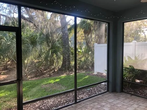 a view of a porch with a back yard