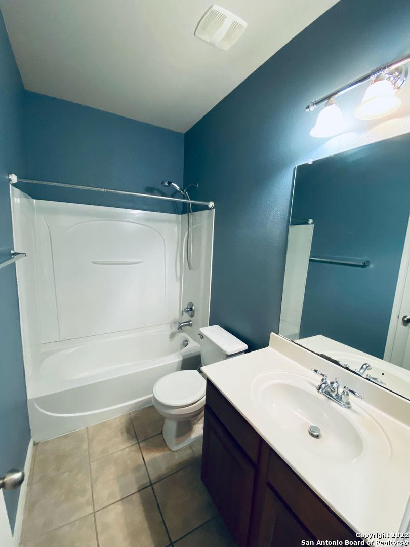 707 Point Sunset San Antonio, TX 78253 - Photo 10 of 15 a bathroom with a sink toilet and shower