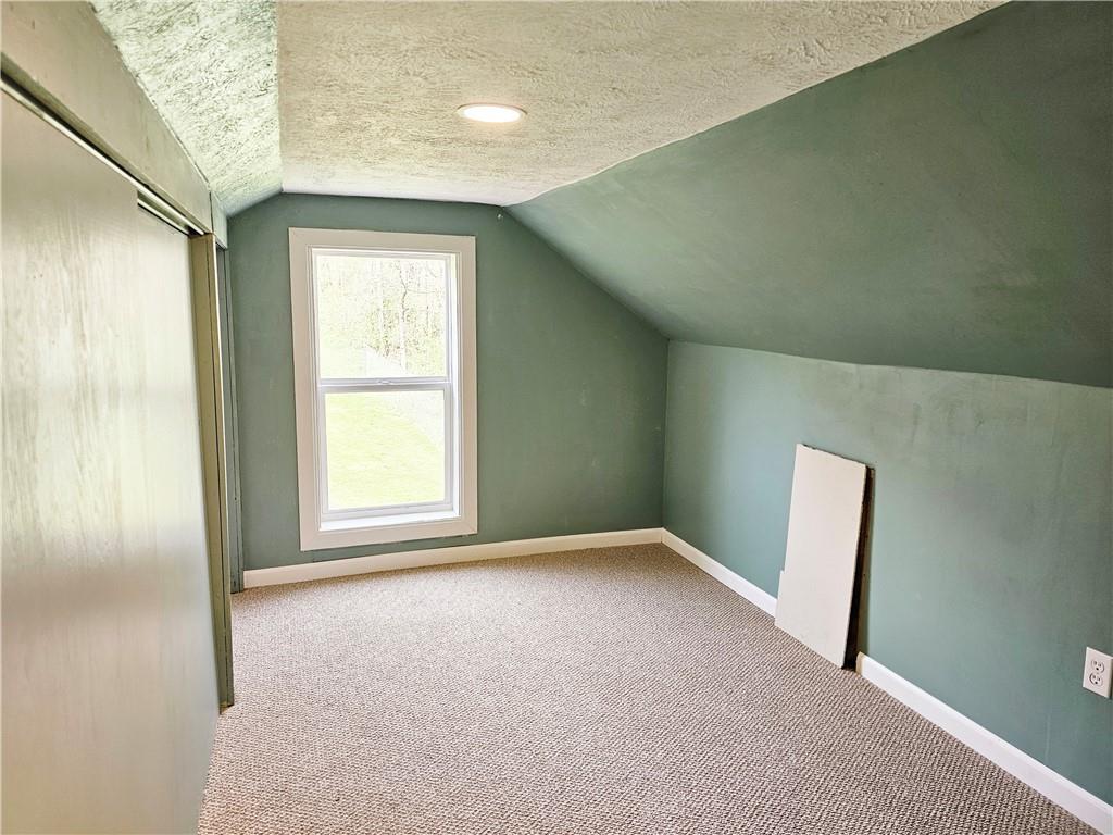 117 Little Rock Road Kittanning, PA 16201 - Photo 15 of 23 an empty room with windows