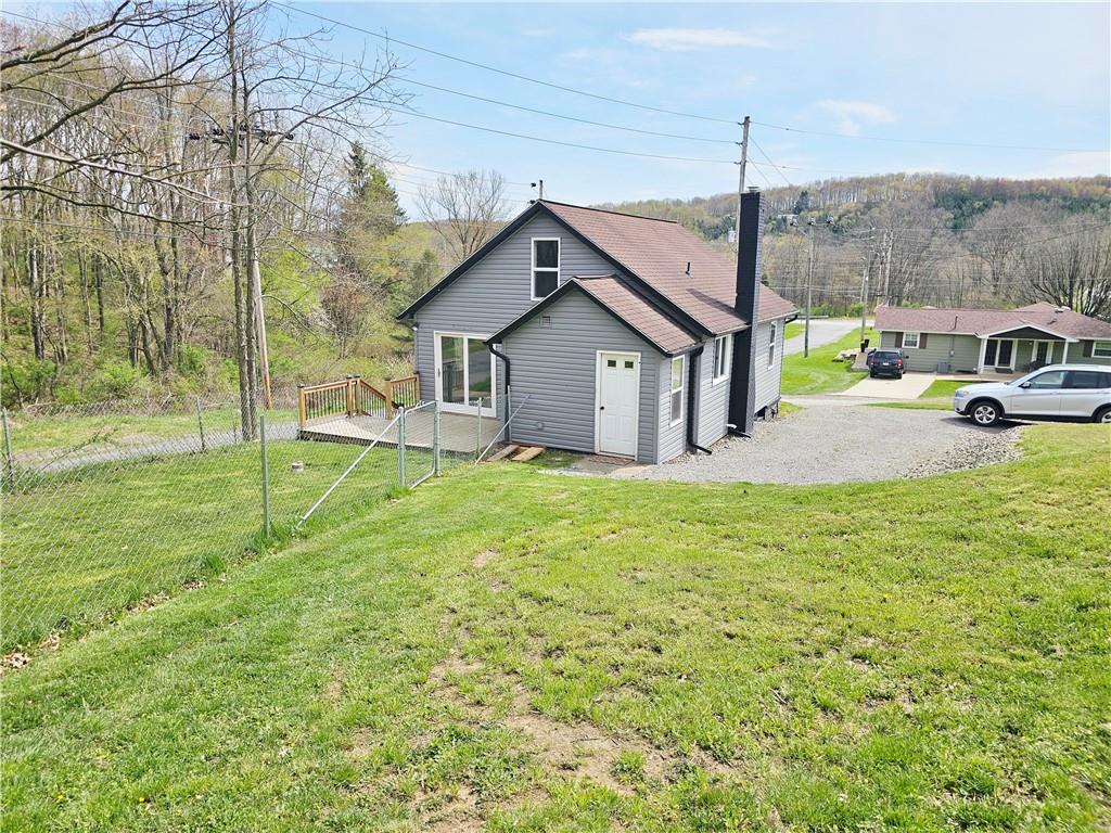 117 Little Rock Road Kittanning, PA 16201 - Photo 2 of 23 a view of a house with a big yard and large tree