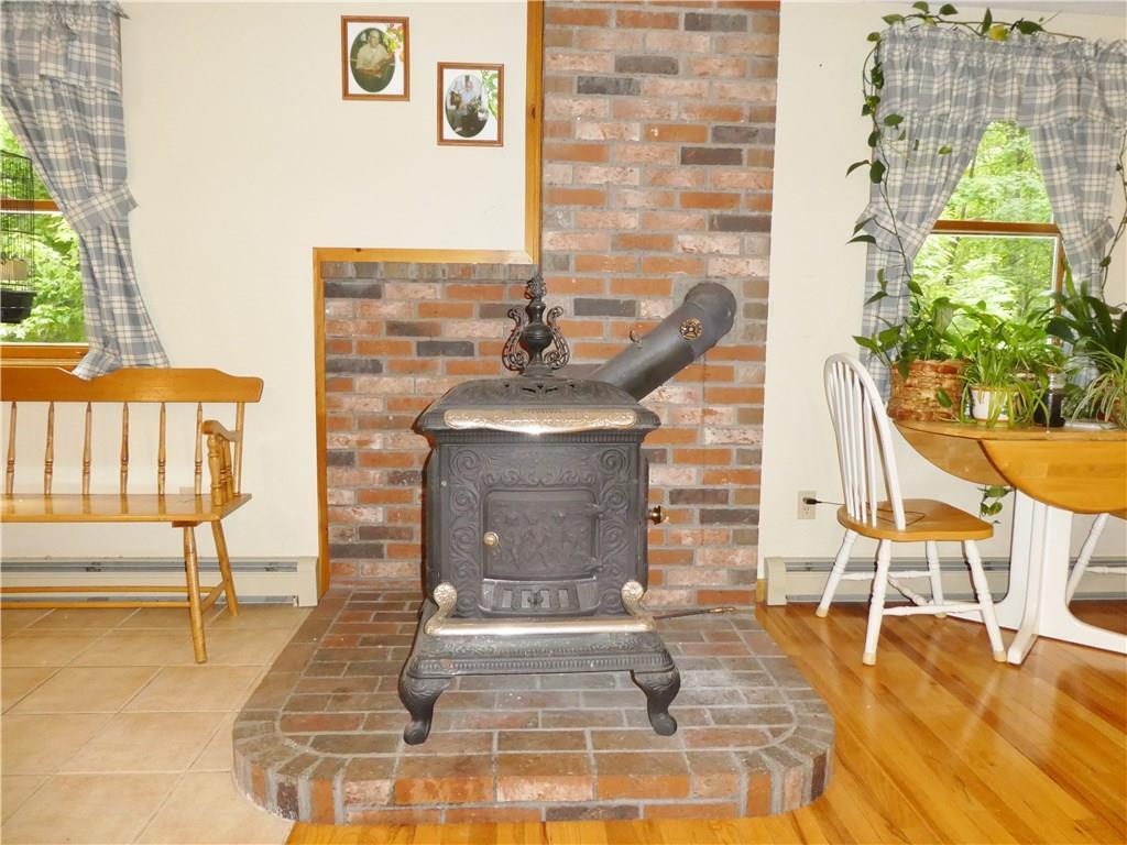 140 Harmons Beach Road Standish, ME 04084 - Photo 14 of 32 Woodstove Kitchen/ Dining Room