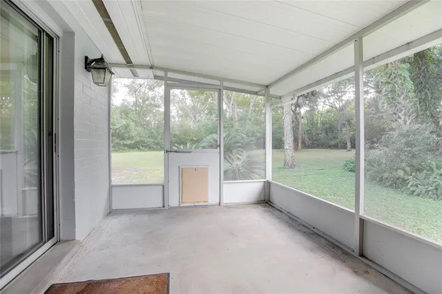 a view of a room with window and an outdoor view