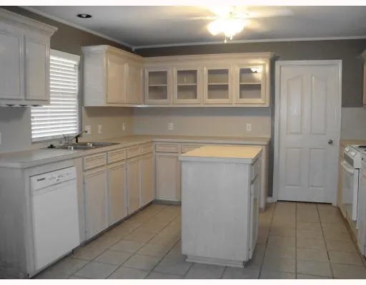 a view of a kitchen with a sink