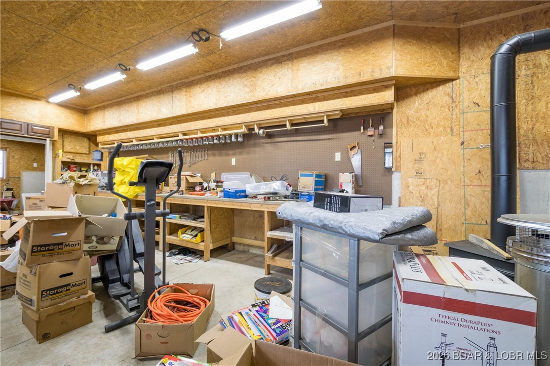 30857 Berry Road Stover, MO 65078 - Photo 50 of 58 Photo of extra long tool bench across back wall