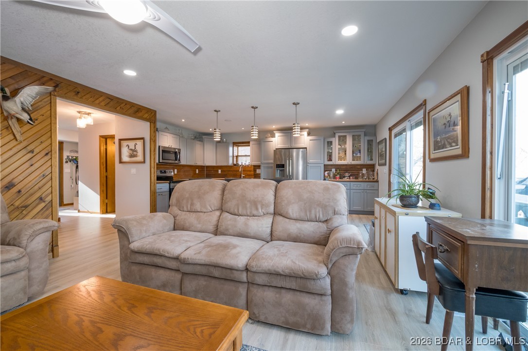 30857 Berry Road Stover, MO 65078 - Photo 9 of 58 Living room on main level Open to kitchen