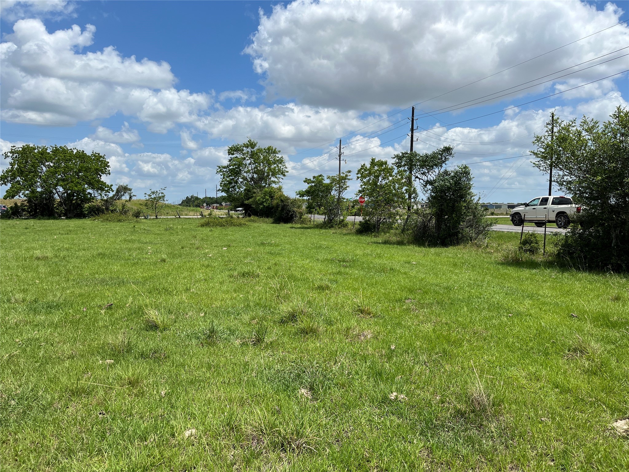 Tbd Katy Hockley Road Katy, TX 77493 - Photo 4 of 6 a view of a big yard with a house in the background