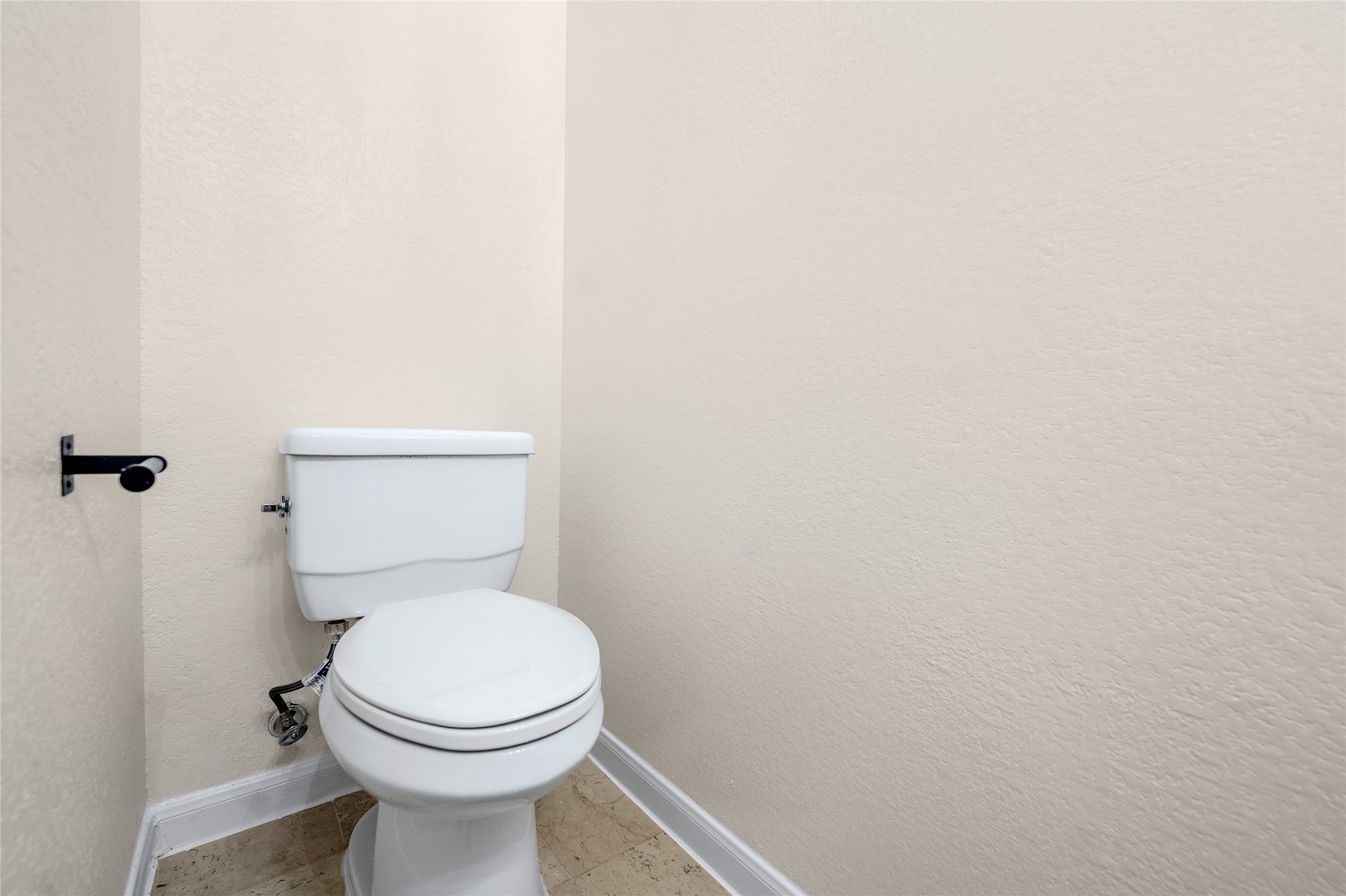 13102 Hunters Chase Drive Austin, TX 78729 - Photo 15 of 39 a white toilet sitting next to a white wall