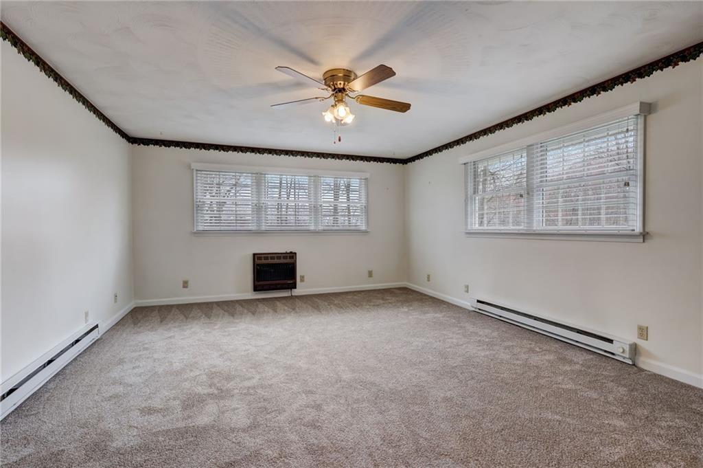 139 La Ray Drive Butler, PA 16001 - Photo 12 of 31 an empty room with windows and fan