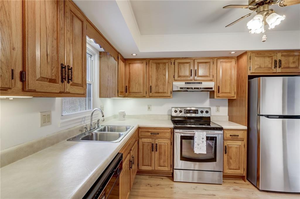 139 La Ray Drive Butler, PA 16001 - Photo 14 of 31 a kitchen with a stove a sink and a refrigerator