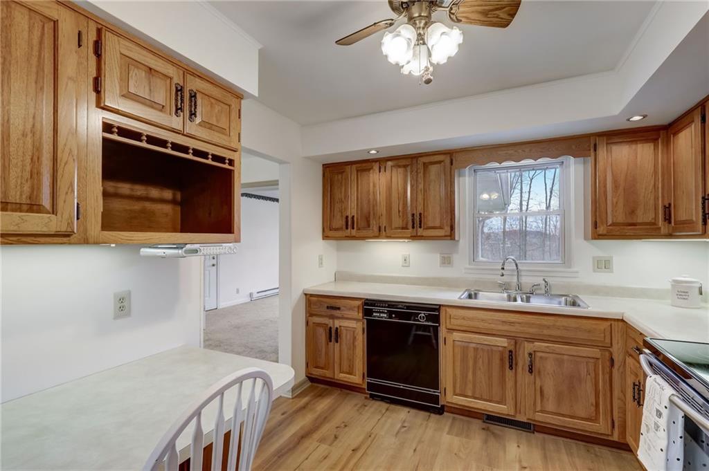 139 La Ray Drive Butler, PA 16001 - Photo 16 of 31 a kitchen with stainless steel appliances a sink stove and microwave