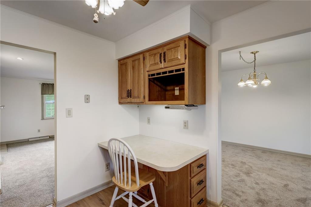 139 La Ray Drive Butler, PA 16001 - Photo 17 of 31 a kitchen with a table chairs and microwave
