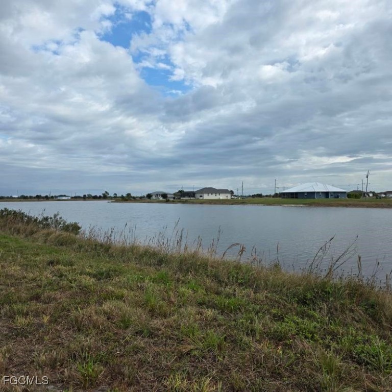 12 Loon Lane Placida, FL 33946 - Photo 28 of 35 a view of a lake from a yard
