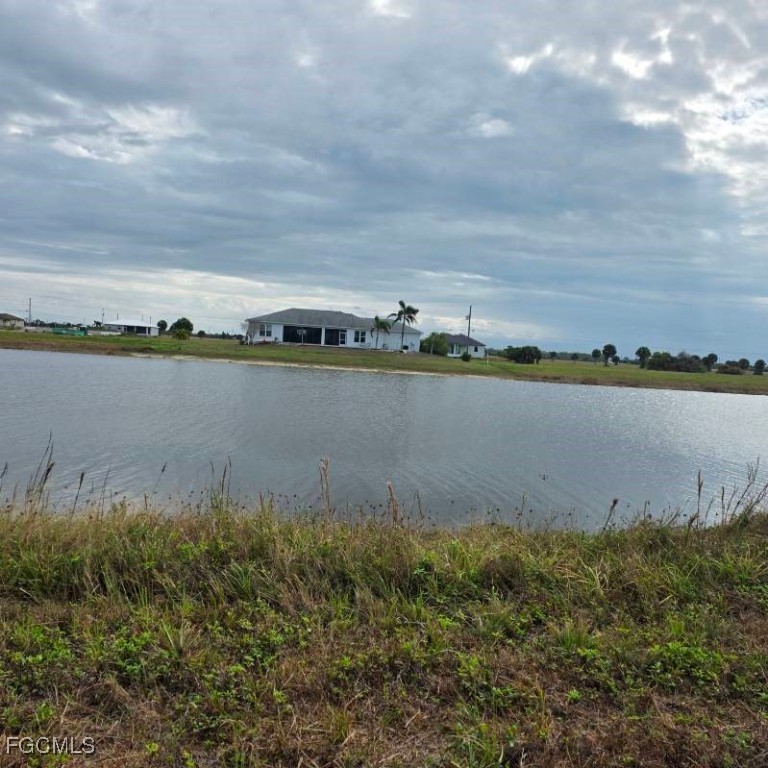 12 Loon Lane Placida, FL 33946 - Photo 29 of 35 a view of a lake with houses in the back