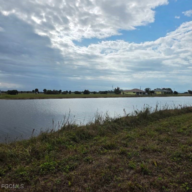 12 Loon Lane Placida, FL 33946 - Photo 30 of 35 a view of a lake with houses in the back