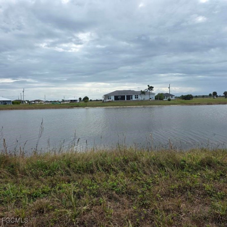 12 Loon Lane Placida, FL 33946 - Photo 31 of 35 a view of a lake with houses in back