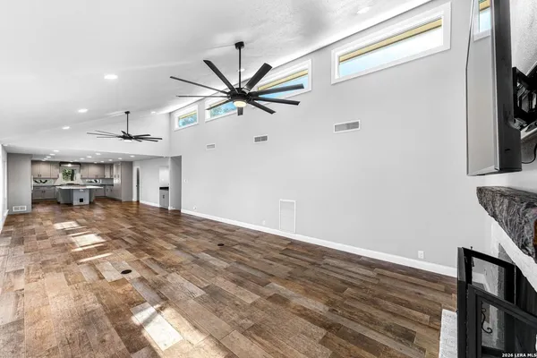 a kitchen with a sink cabinets and window