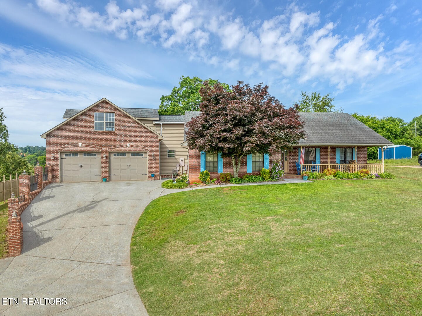 449 Foss Road Maryville, TN 37801 - Photo 10 of 49 a front view of a house with a garden