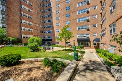 a view of a building with garden