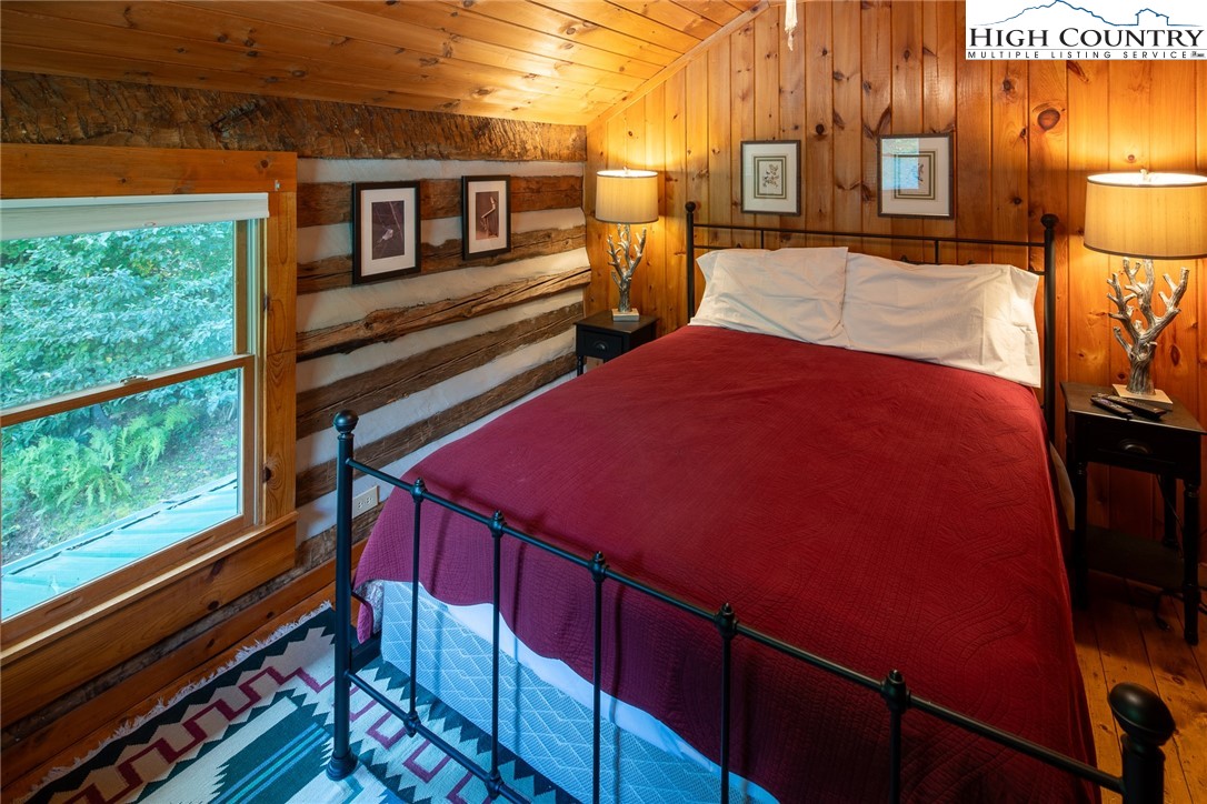 142 Teaberry Path Boone, NC 28607 - Photo 14 of 19 a view of a balcony with two chairs