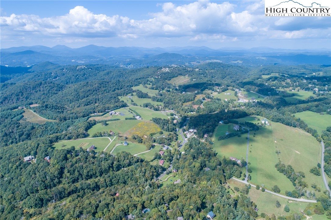 142 Teaberry Path Boone, NC 28607 - Photo 19 of 19 an aerial view of residential houses with outdoor space and trees